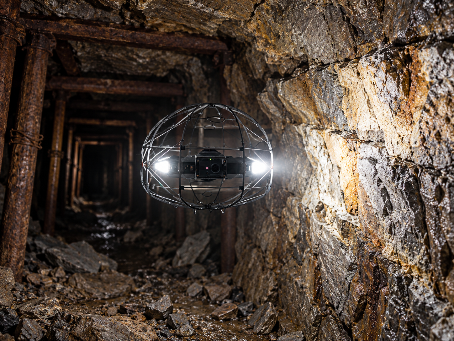 Flybotix ASIO X collision-tolerant drone in an underground tunnel inspection setting
